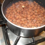 بالصور عمل الفول بالطماطم