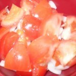 بالصور عمل الفول بالطماطم