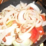 بالصور عمل الفول بالطماطم