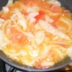 بالصور عمل الفول بالطماطم