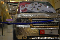 شركة مخصوصة في تغطية سيارات بآلاف العملات المعدنية اللامعة