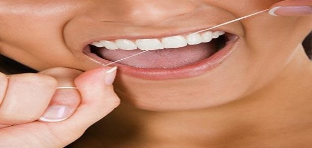 كيف أستخدم خيط الأسنان