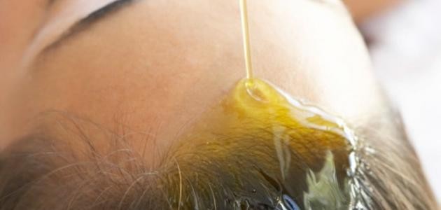 فوائد حمامات الزيت للشعر فوائد حمامات الزيت للشعر